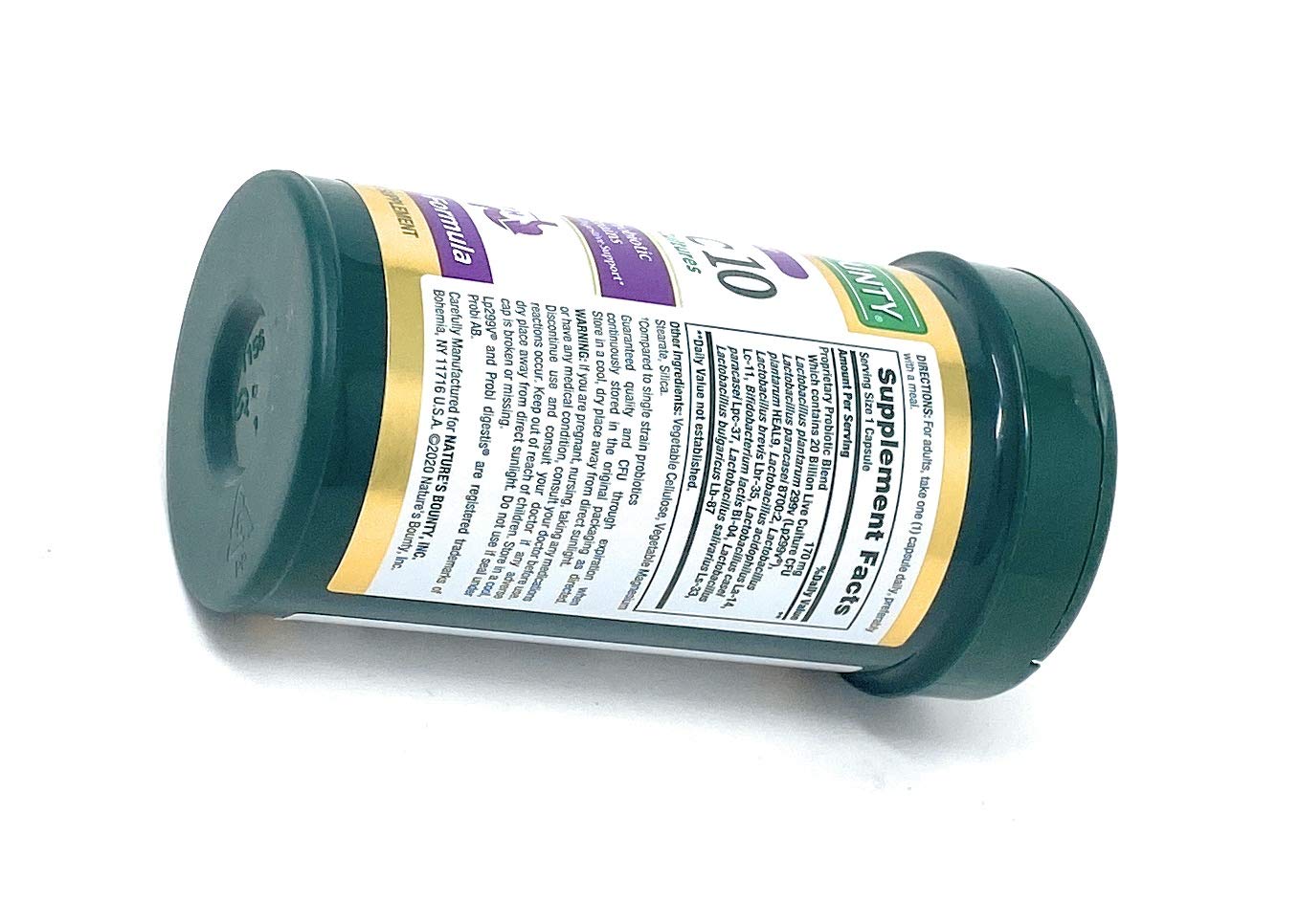 Nature's Bounty Probiotic 10 capsules beside water promote effortless daily use.