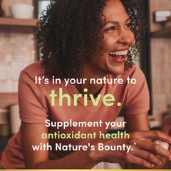Nature's Bounty Turmeric bottle with cap demonstrating convenient capsule form