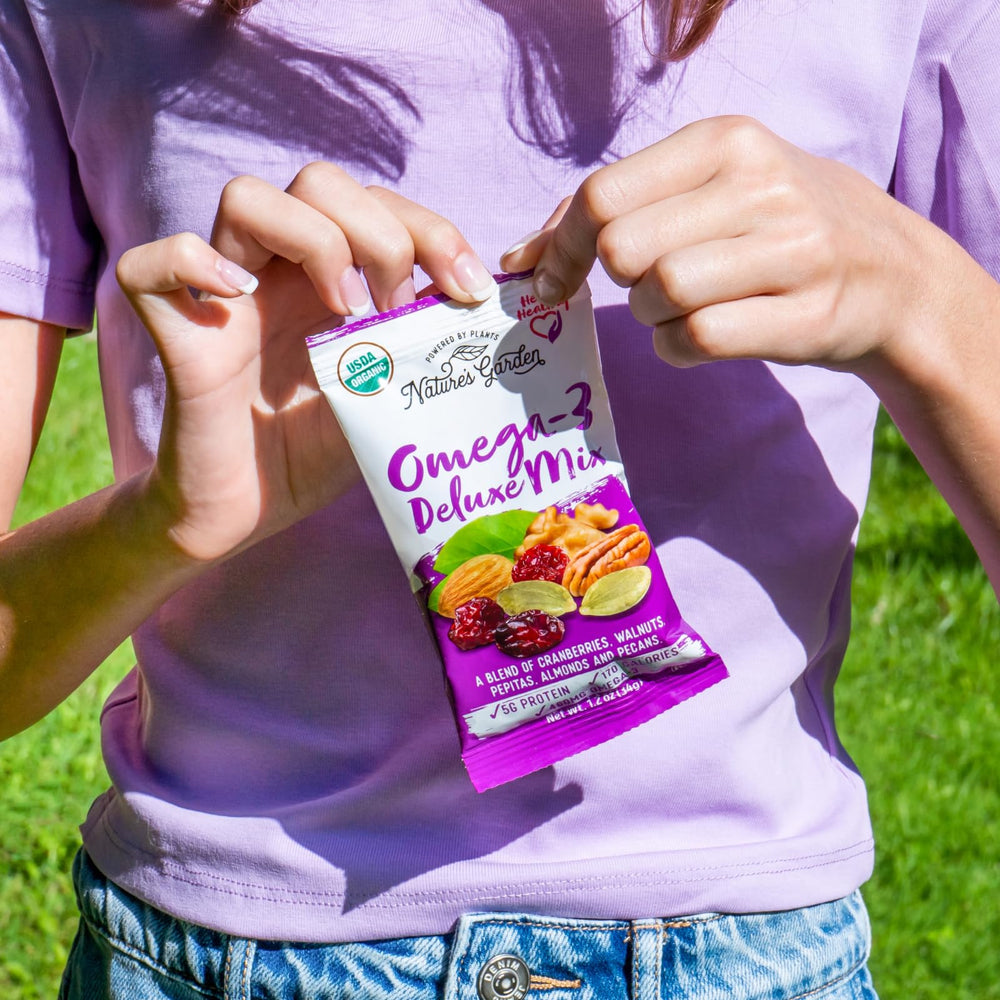 Nature's Garden Omega-3 Deluxe Mix serving open bag invites convenient fueling