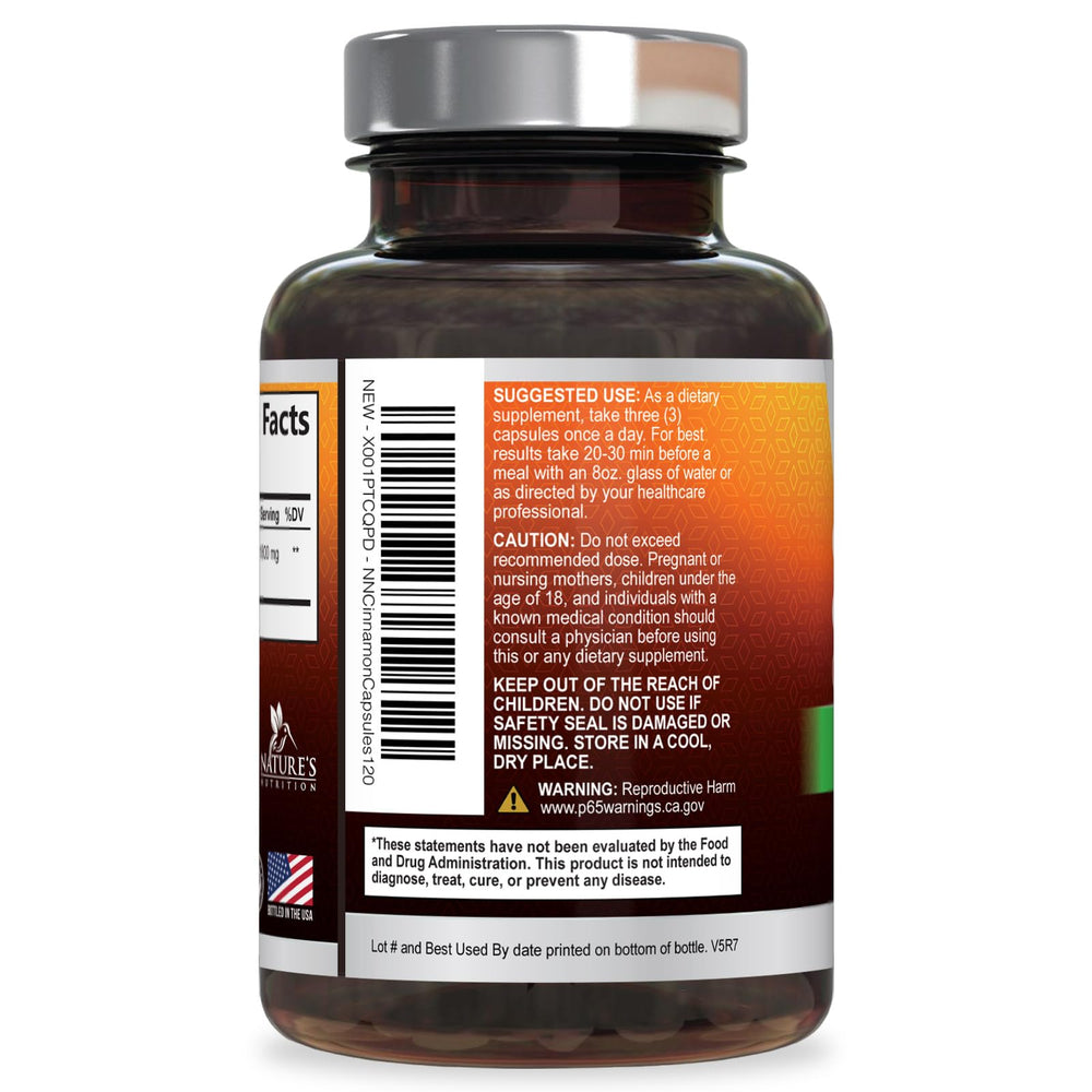 Nature's Nutrition 1800mg cinnamon capsules on a clean countertop.