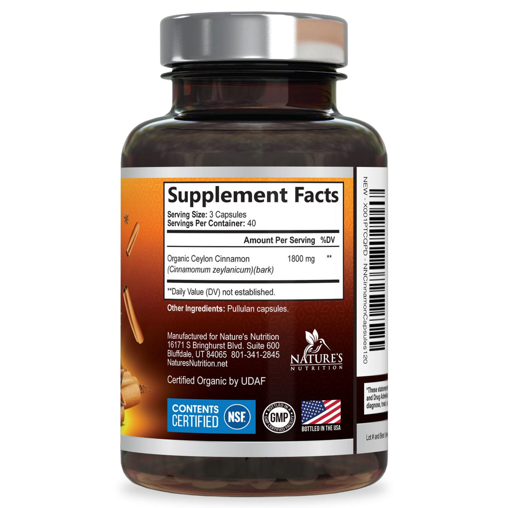 Nature's Nutrition Cinnamon capsules with a green seal indicating testing.