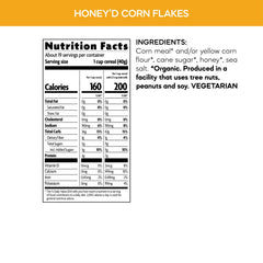 Pouring milk over Nature's Path Honey'D Corn Flakes for a crisp breakfast.