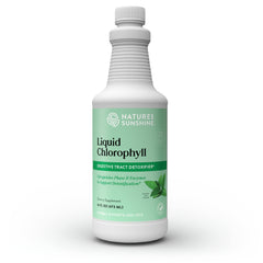 Nature's Sunshine Liquid Chlorophyll bottle poured for a refreshing daily detox ritual.