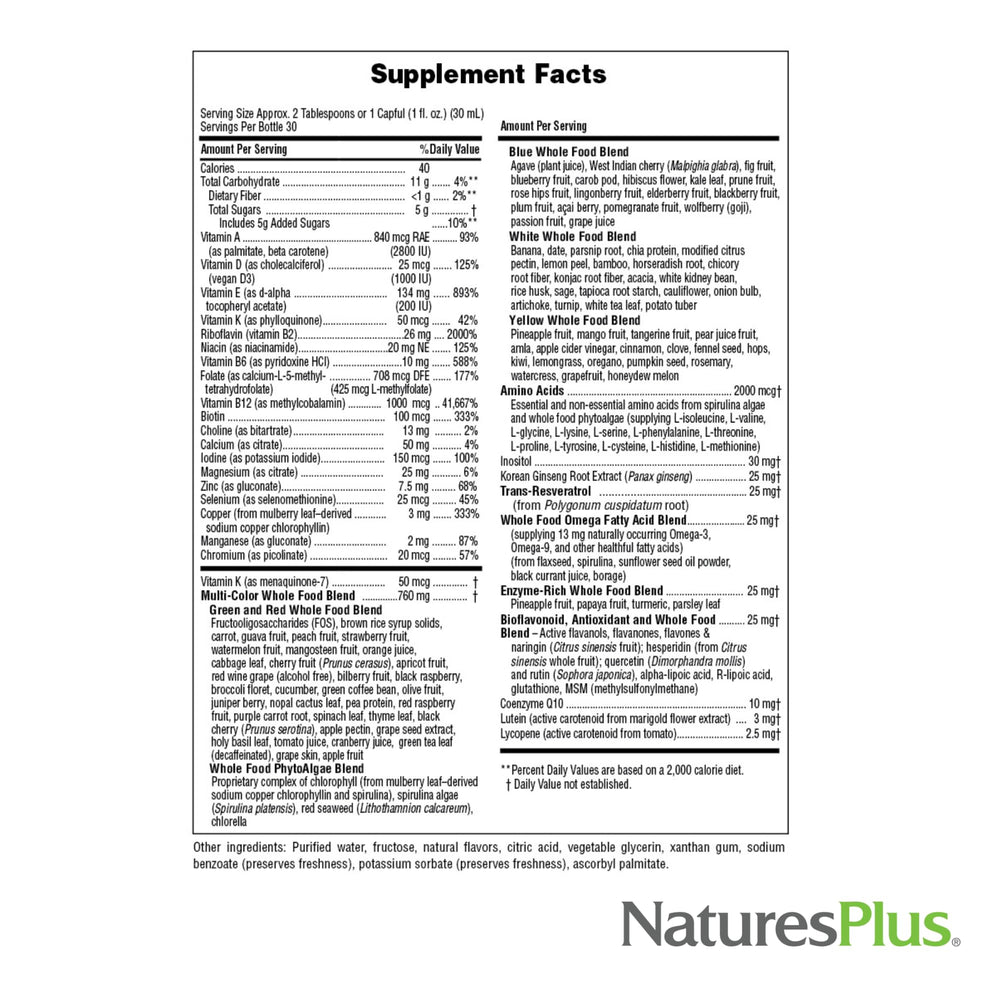 NaturesPlus Source of Life GOLD liquid being dispensed into a spoon.