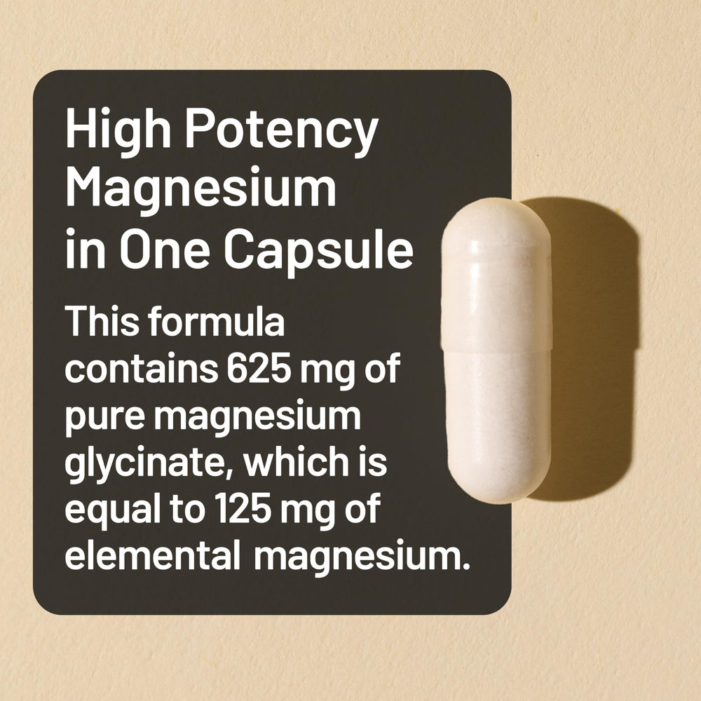 Close-up of NatureWise Magnesium Glycinate capsules highlighting high absorption.