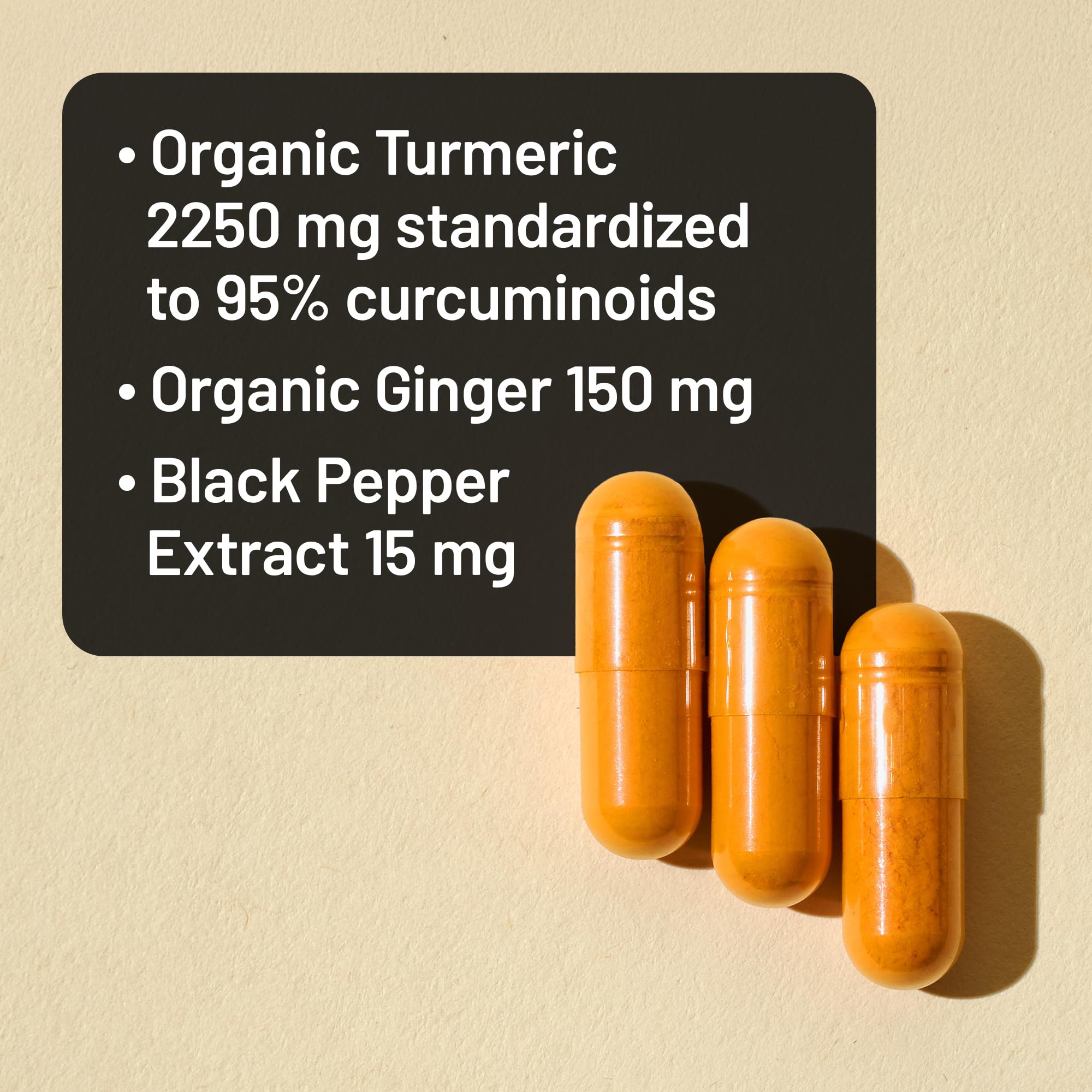NatureWise turmeric-curcumin-ginger 2400mg capsules arranged for daily use.