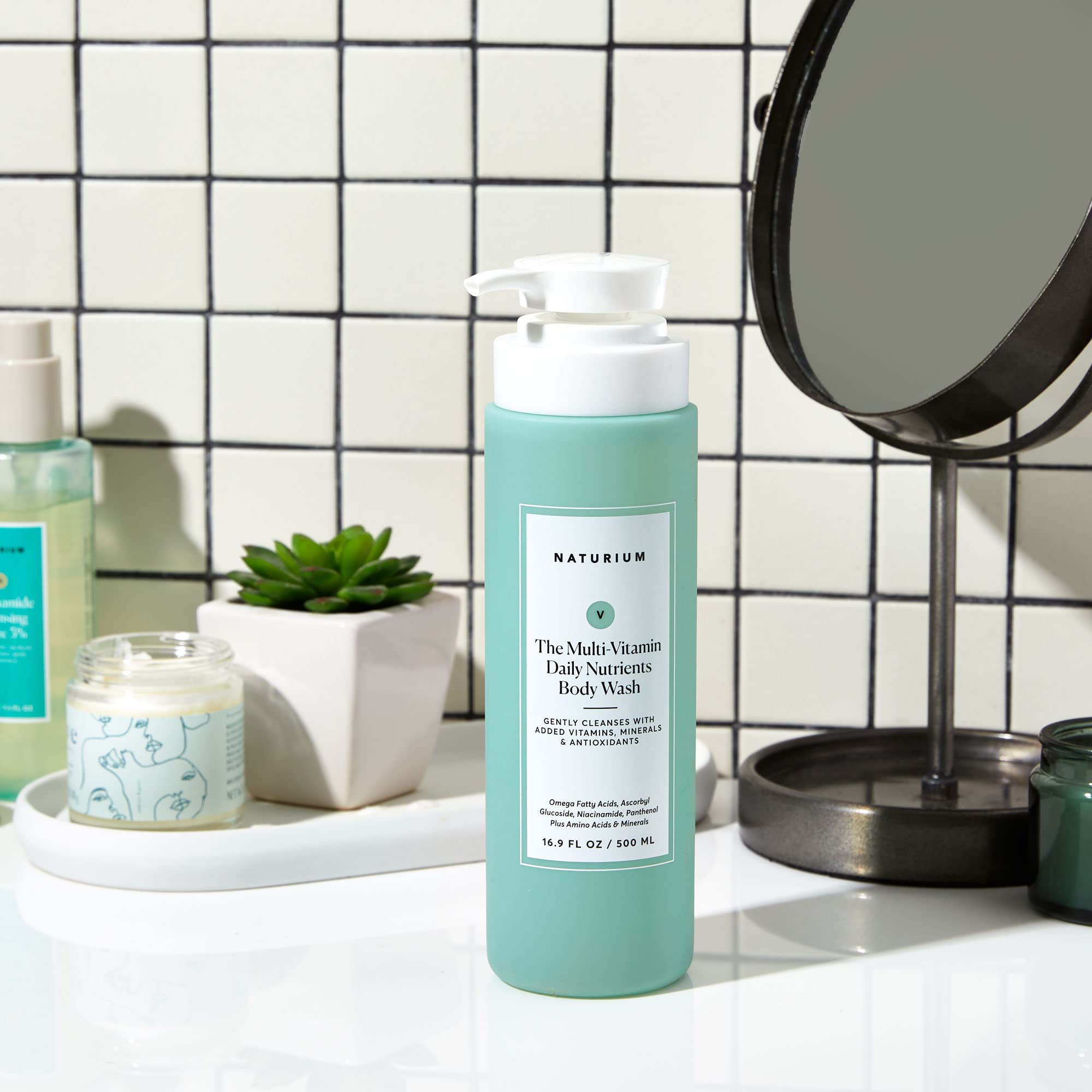 Naturium body wash lather illustrates gentle cleansing for body and face