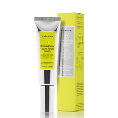Naturium Retinaldehyde Cream Serum bottle close-up highlighting anti-aging formulation.