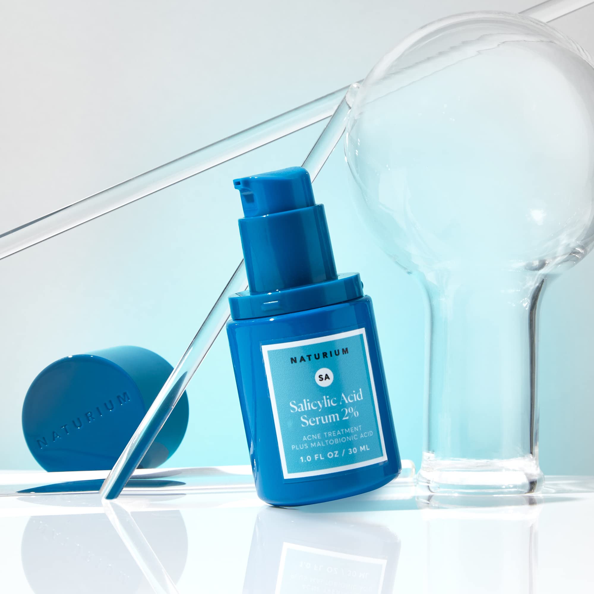 Naturium Salicylic Acid Serum packaging highlights USA-made, vegan, dermatologist-tested formula.