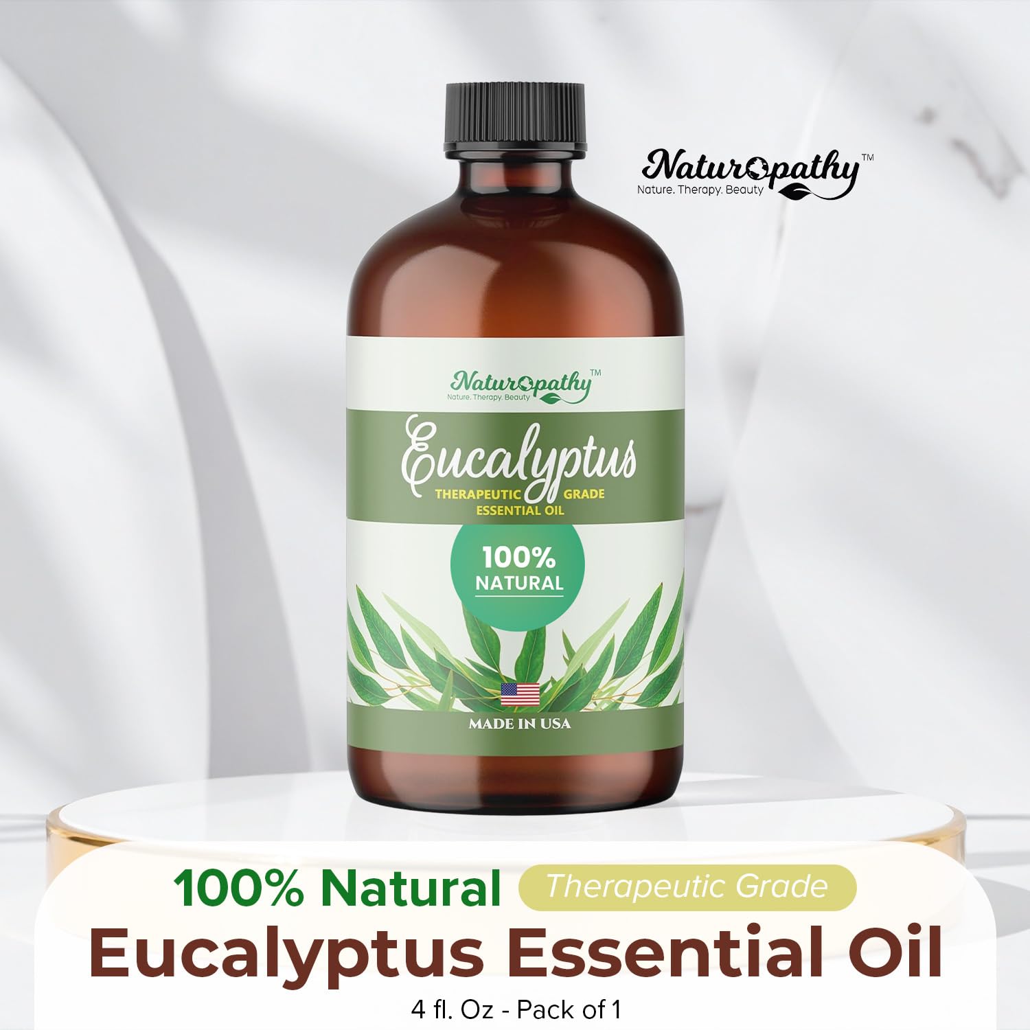 NATUROPATHY Eucalyptus essential oil cap close-up showing secure seal.
