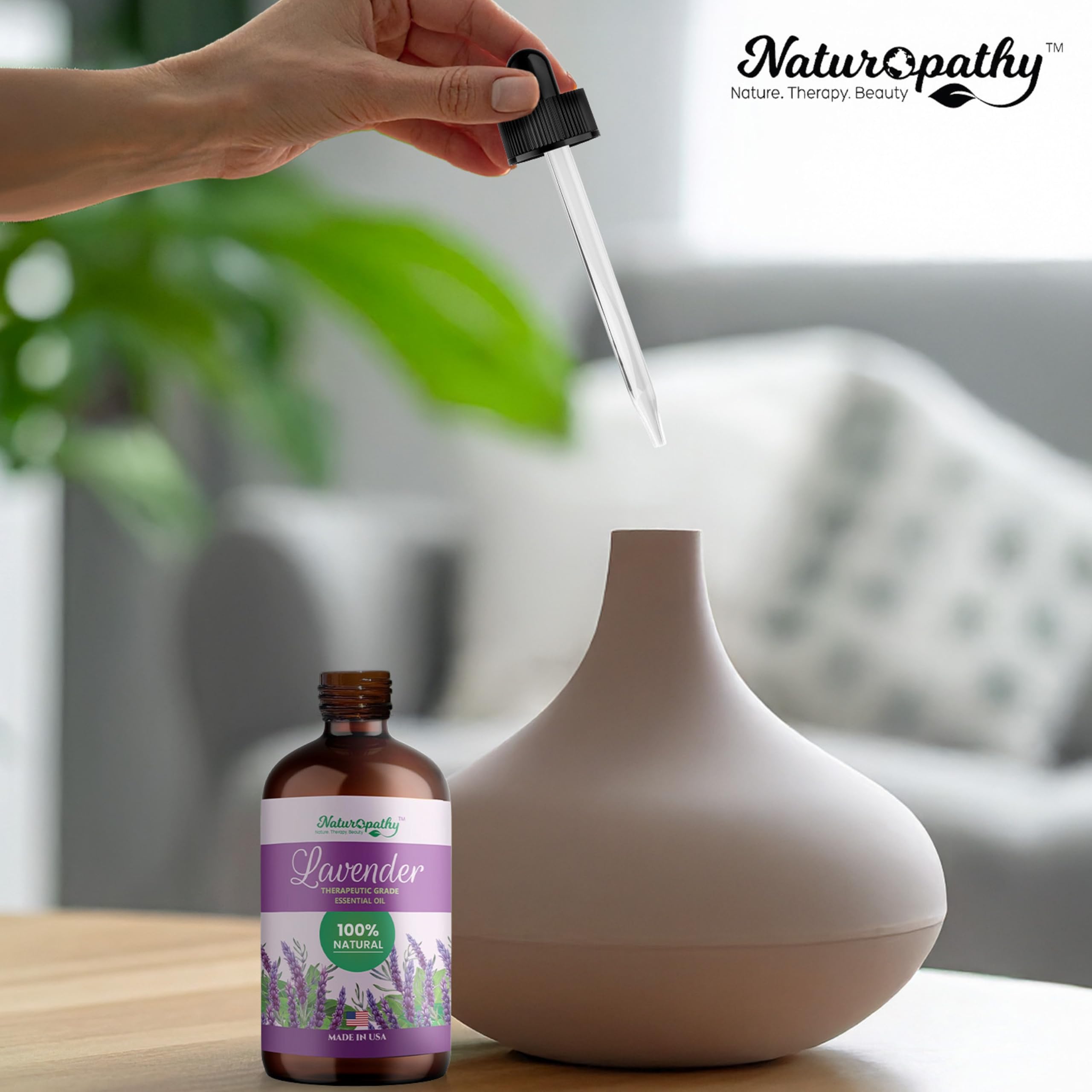 Naturopathy lavender oil bottle shown with USA bottling and quality.