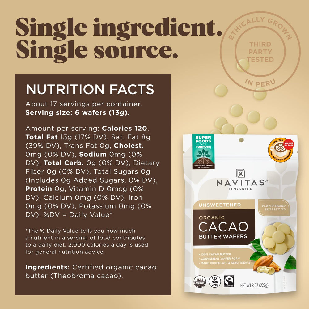 Navitas Organics cacao butter wafers close-up reveals silky texture for rich desserts.