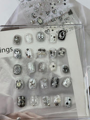 NBNTGH metal-design nail art enhances gel or acrylic manicures.