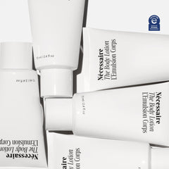 Nécessaire The Body Lotion ingredients panel highlights barrier-supporting niacinamide and vitamins.
