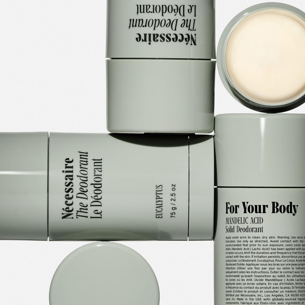 Applying Nécessaire Eucalyptus deodorant for daily underarm protection.