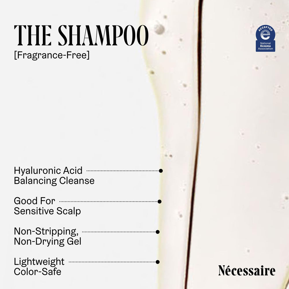 Nécessaire Hair Duo shampoo bottle close-up with visible lather.