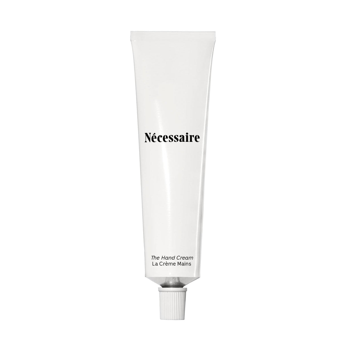 Nécessaire hand cream fragrance-free texture close-up showing smooth hands.