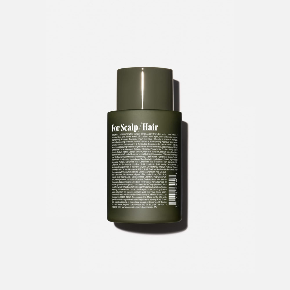 Nécessaire Rosemary Conditioner bottle pour suggests easy application and smooth detangling while styling.