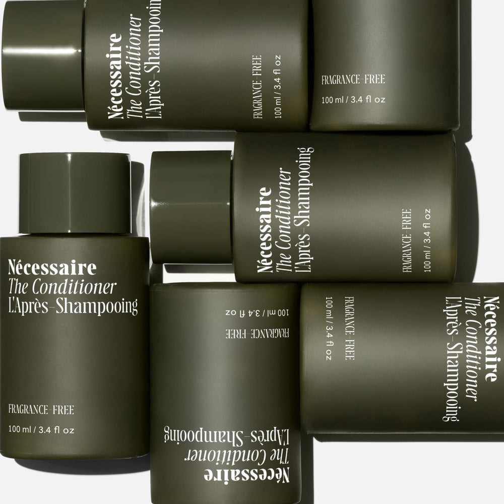 Nécessaire Rosemary Conditioner label closeup highlights sulfate-free, color-safe credentials for color-treated hair.