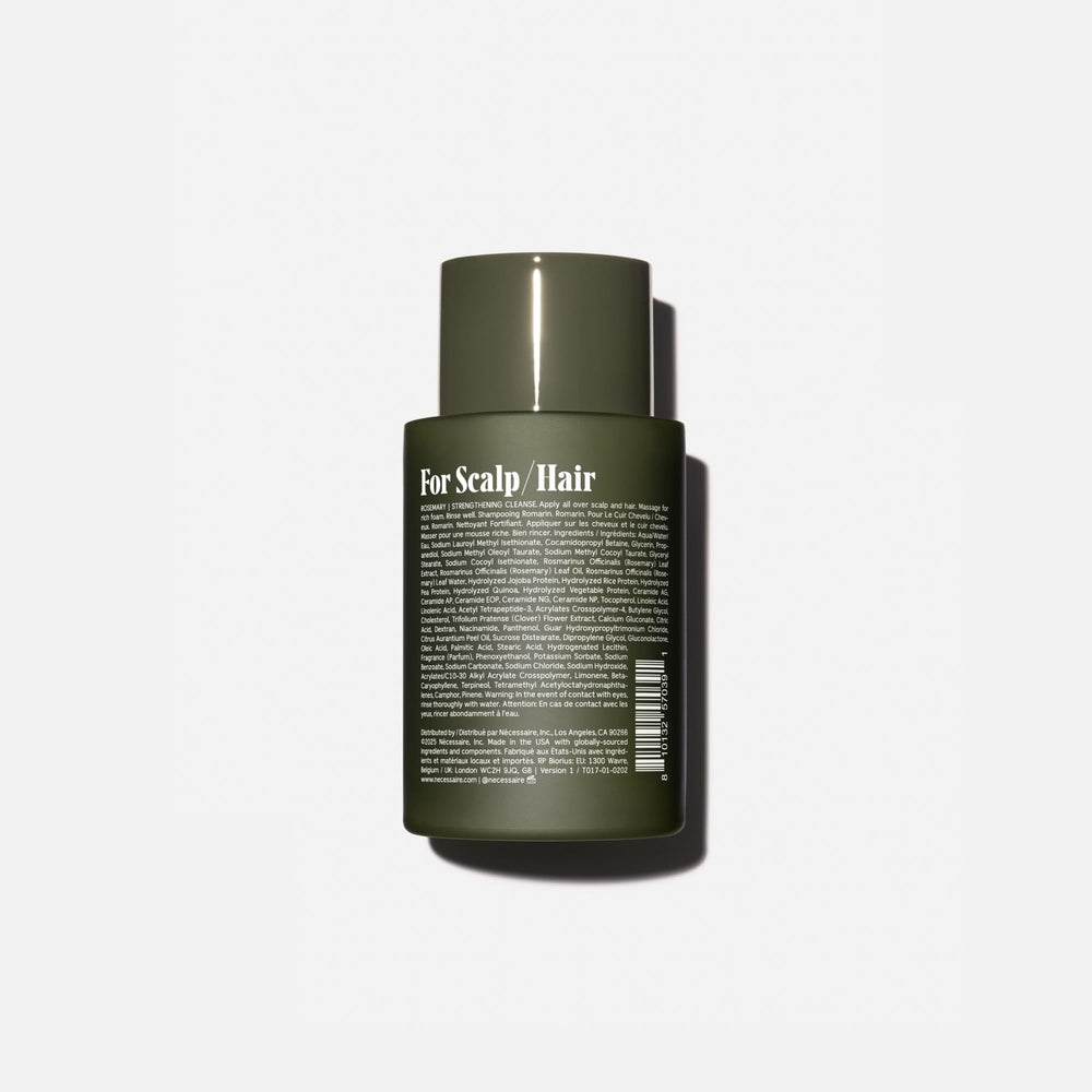 Nécessaire Rosemary Shampoo bottle pour shows distribution of lather for soft, clean hair.