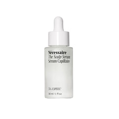 Nécessaire Scalp Serum bottle showing a water-light formula for daily scalp care.