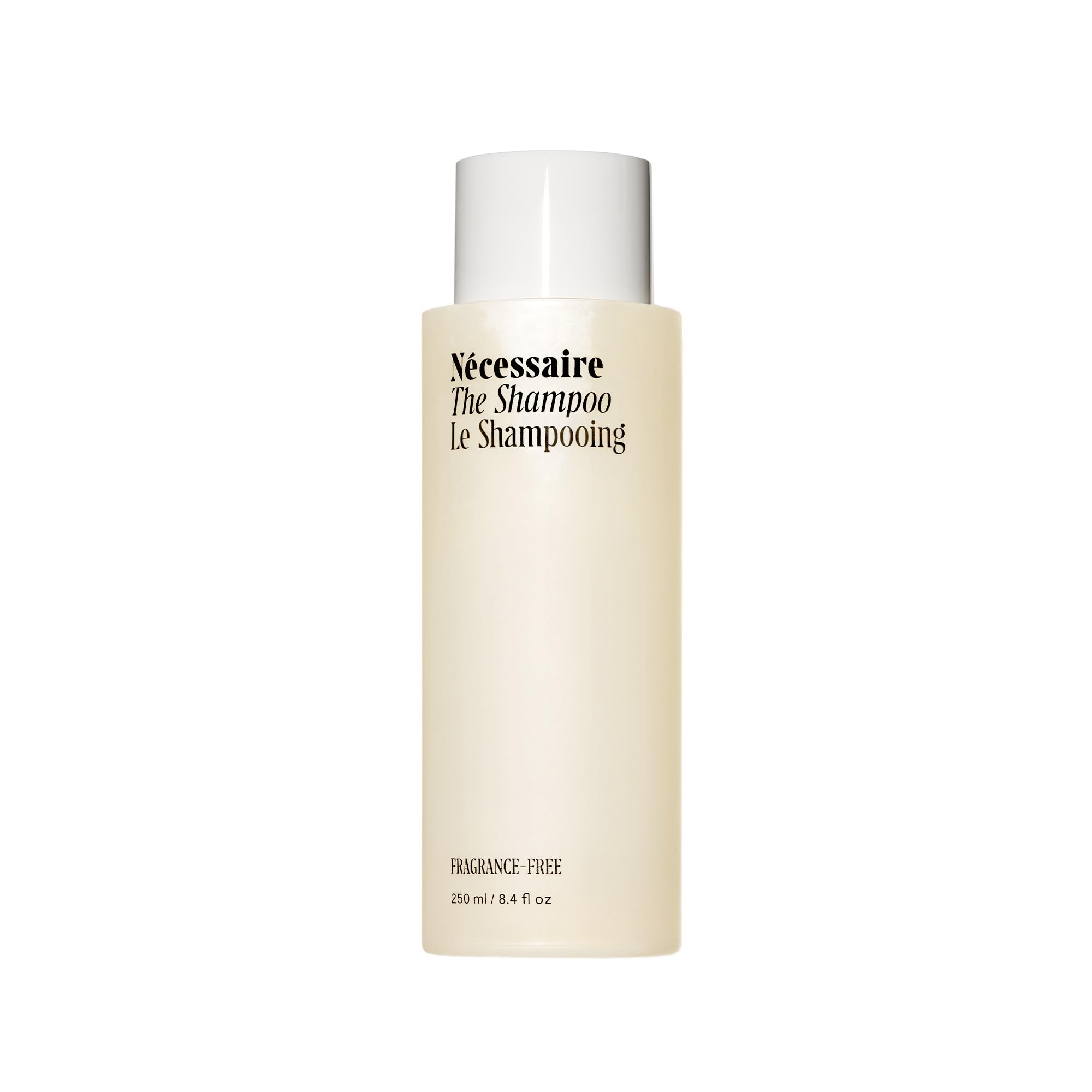 Nécessaire The Shampoo bottle front shows fragrance-free formula for sensitive scalps.