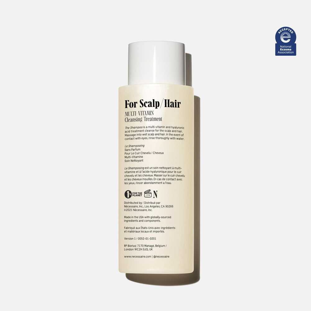 Foamy lather demonstrates gentle daily cleansing for all hair types with Nécessaire Shampoo.