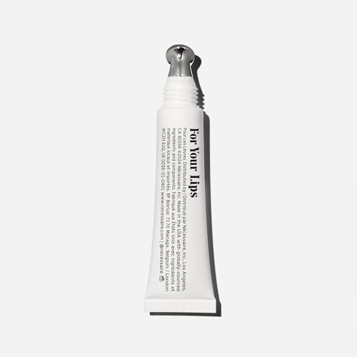 Nécessaire The Lip Balm being applied on lips for instant moisture.