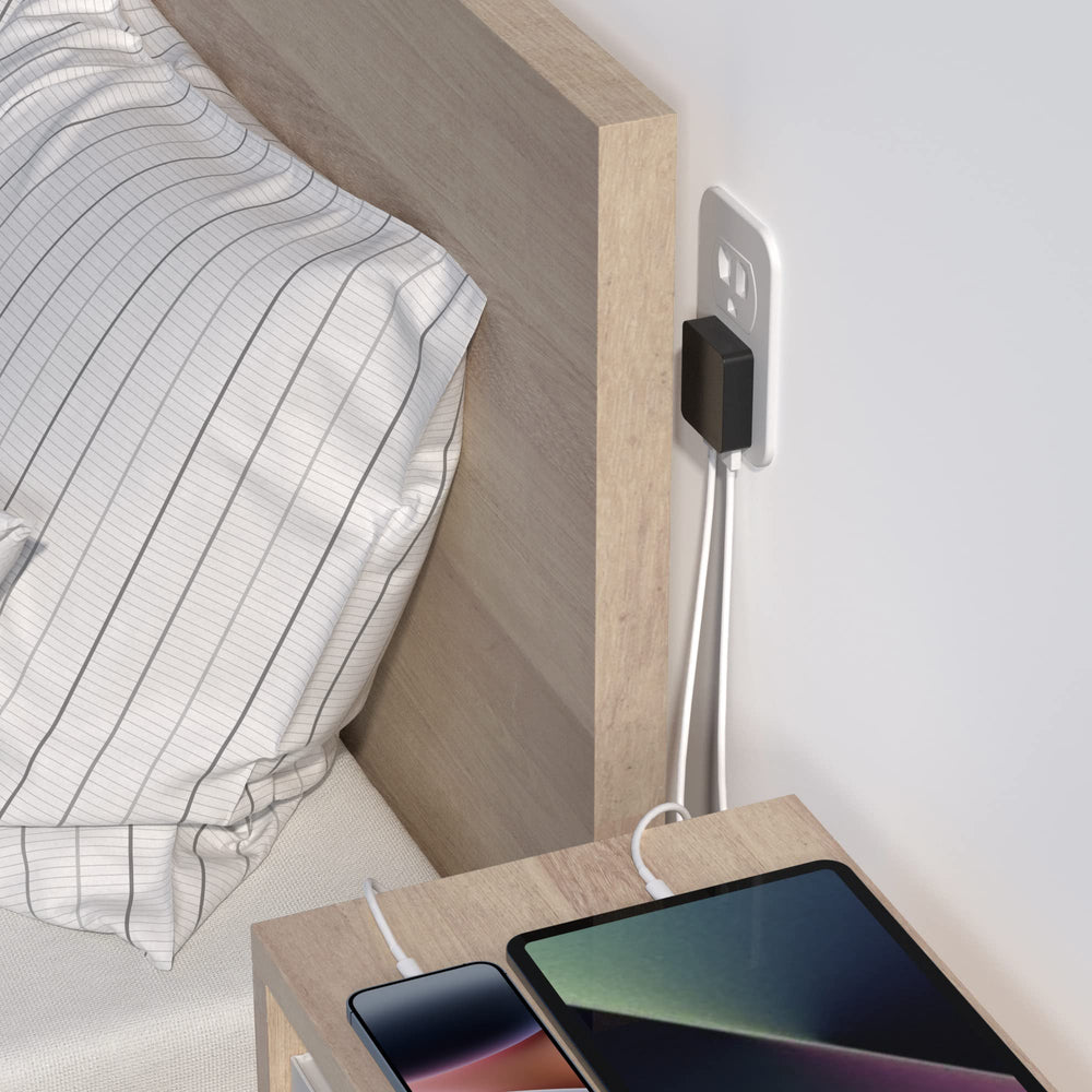 Nekmit charger keeps outlet free for other plugs while charging your iPhone or Switch.