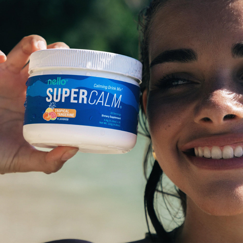 Nello SuperCalm powder dissolved in glass for a refreshing drink