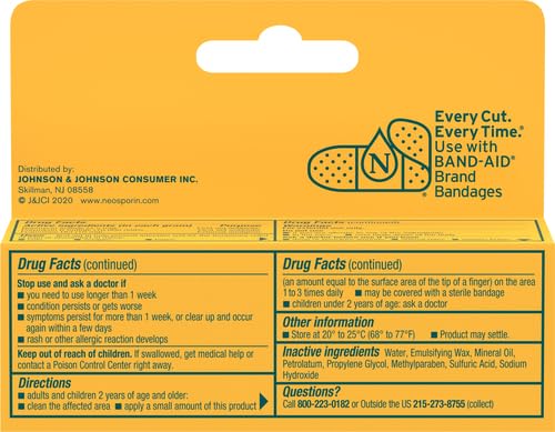 Close-up of Neosporin Pain Relief Cream on skin.