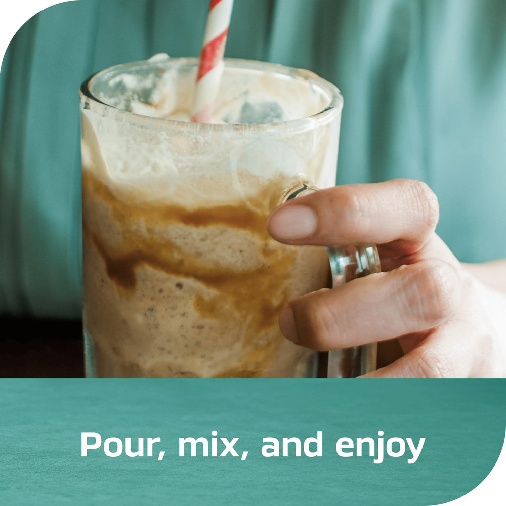 Iced coffee glass using NESCAFÉ Espresso Concentrate for a refreshing drink.