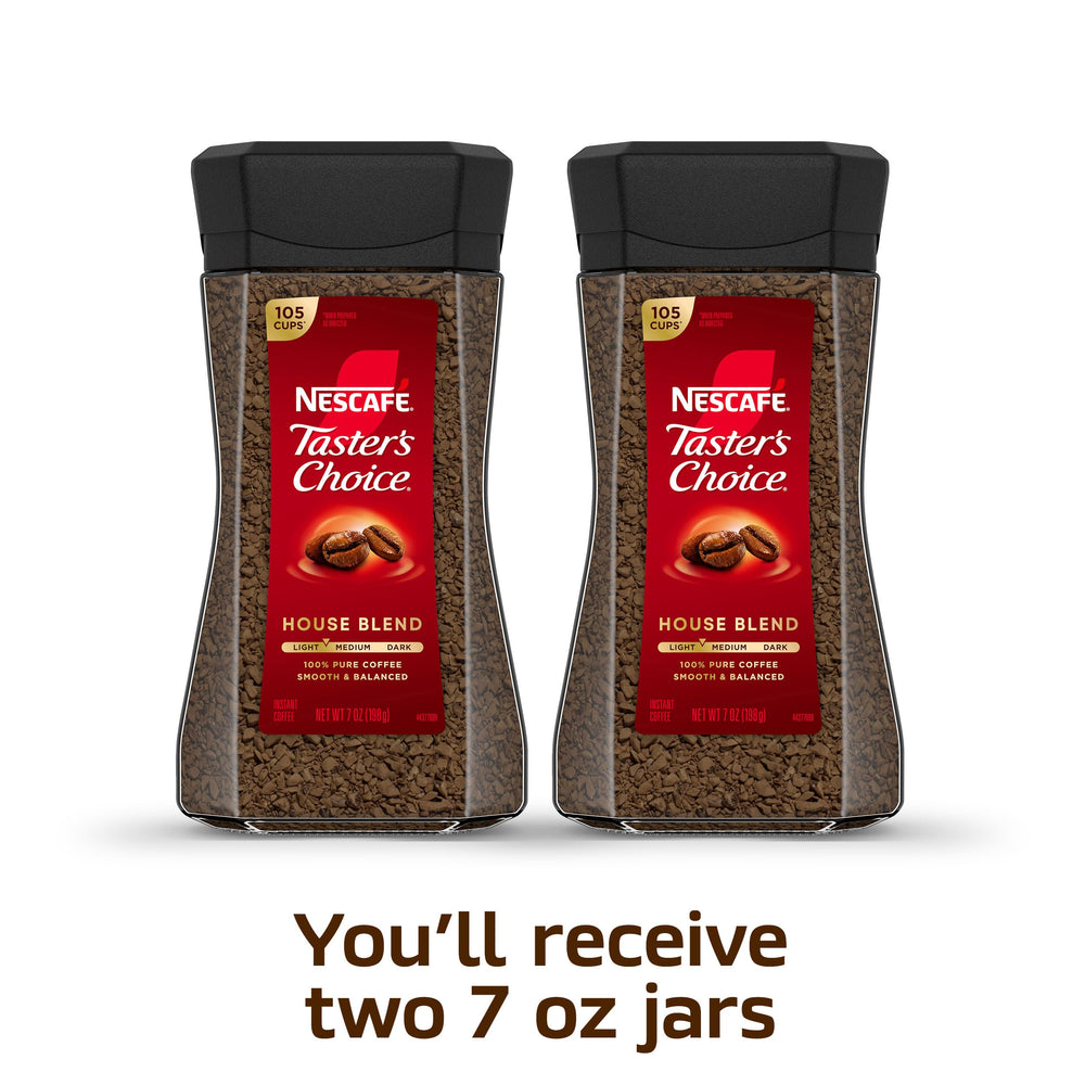 NESCAFÉ Taster's Choice instant coffee being scooped for a quick brew