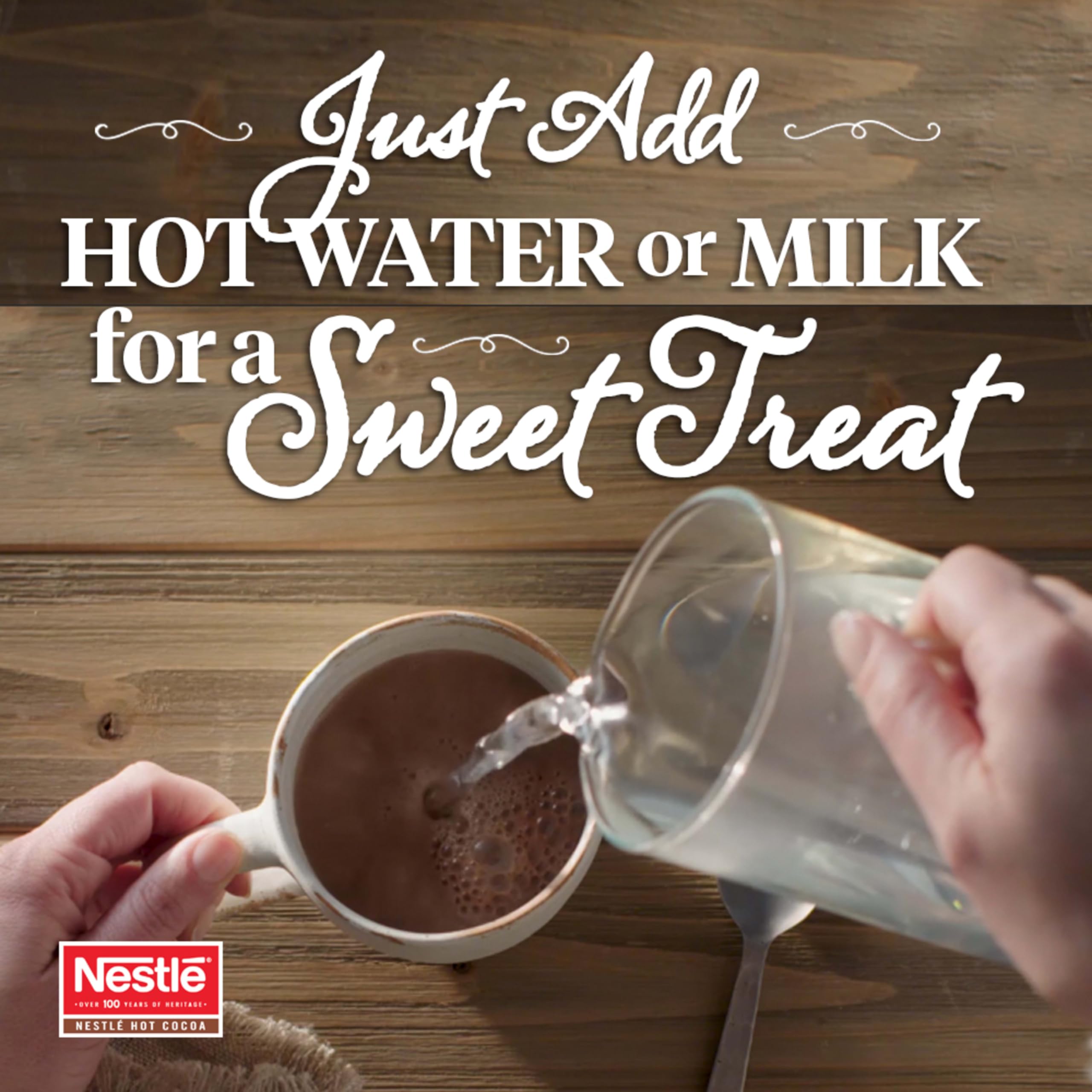 Nestlé Hot Cocoa cup with steam shows creamy aroma for cozy moments
