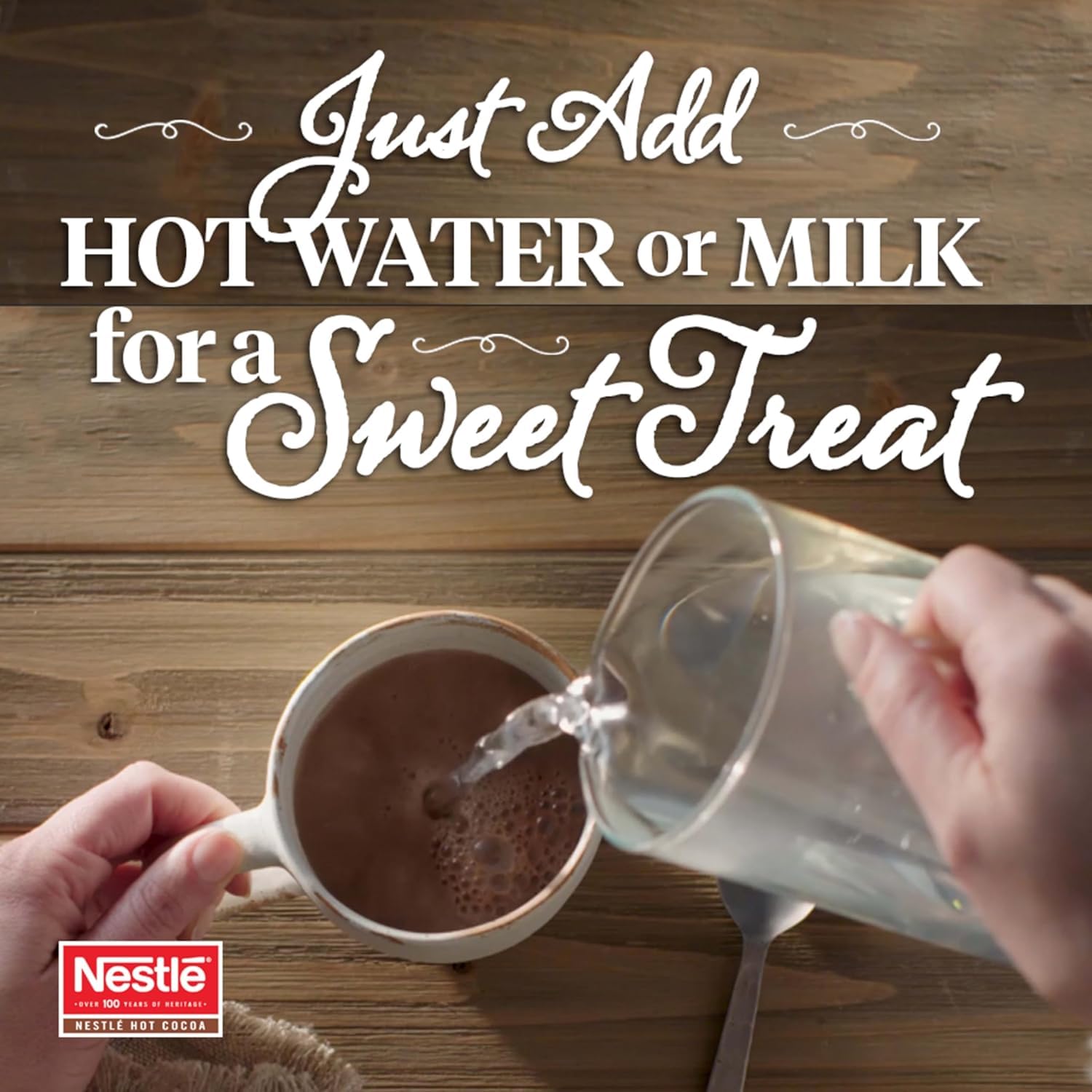 Nestle Hot Cocoa prepared cup; steamy aroma for cozy moments.