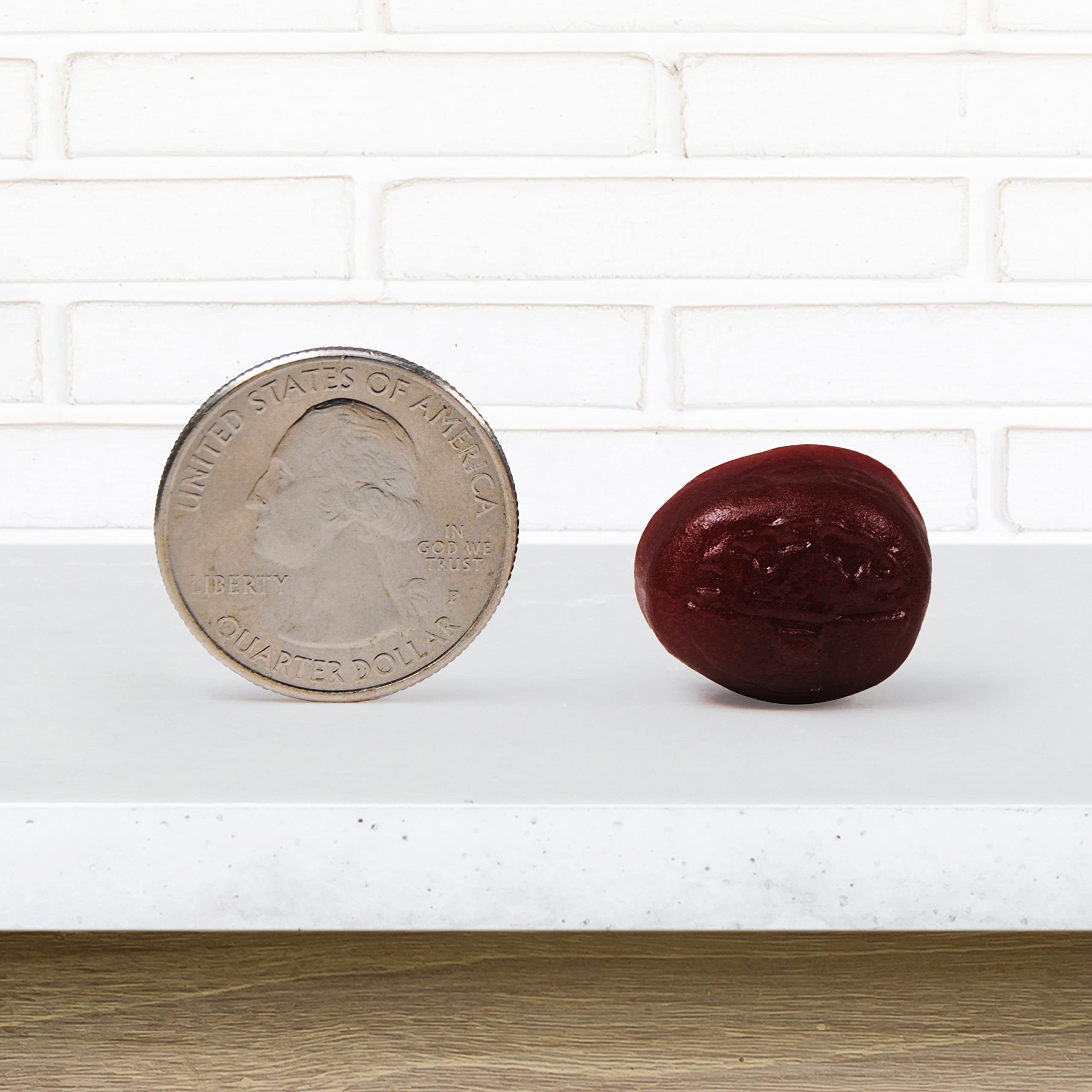 NEURIVA gummy on wood table ready to chew.