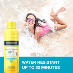 Kids apply Neutrogena Beach Defense spray to arms for lightweight coverage.