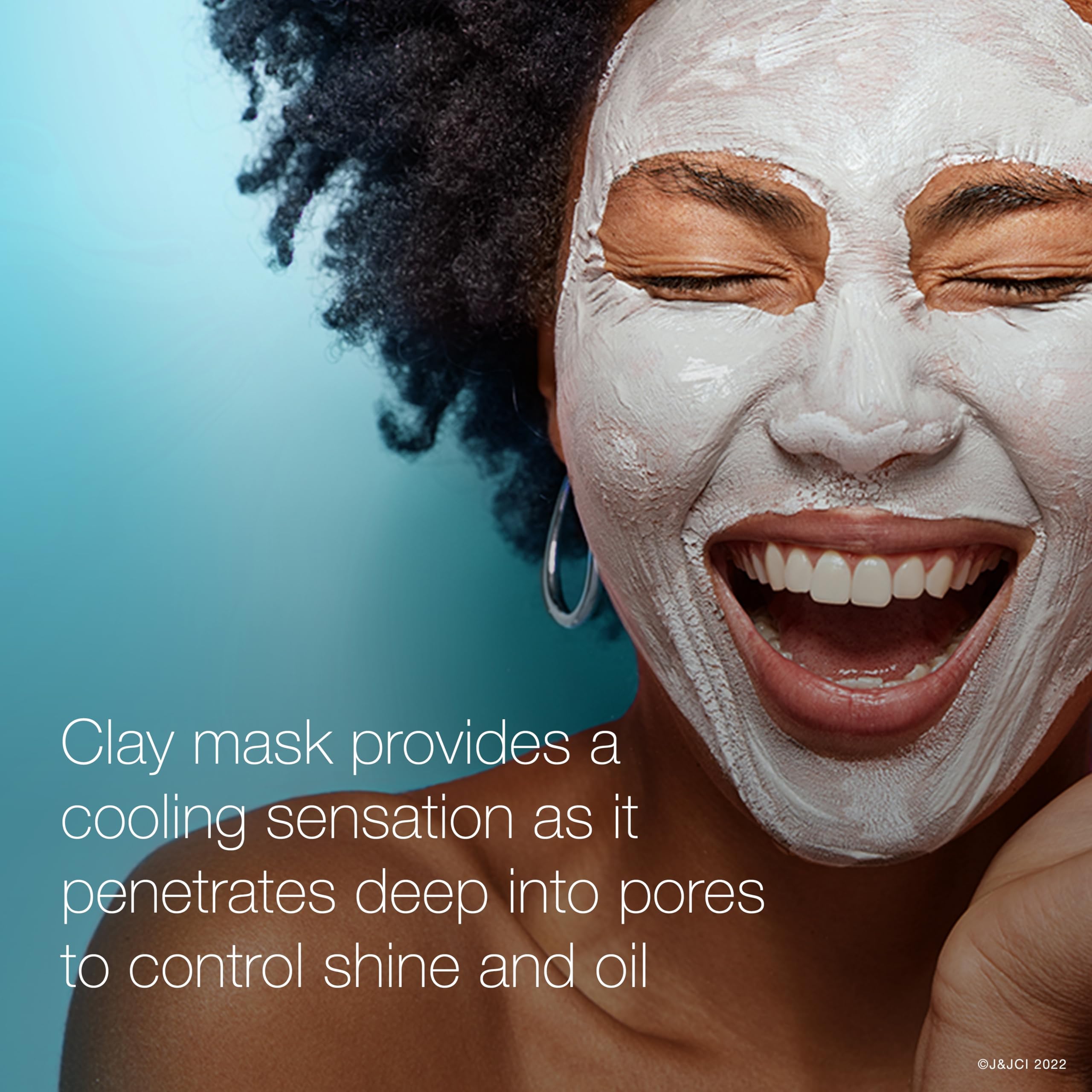 Neutrogena Clear Pore clay mask application close-up on skin.