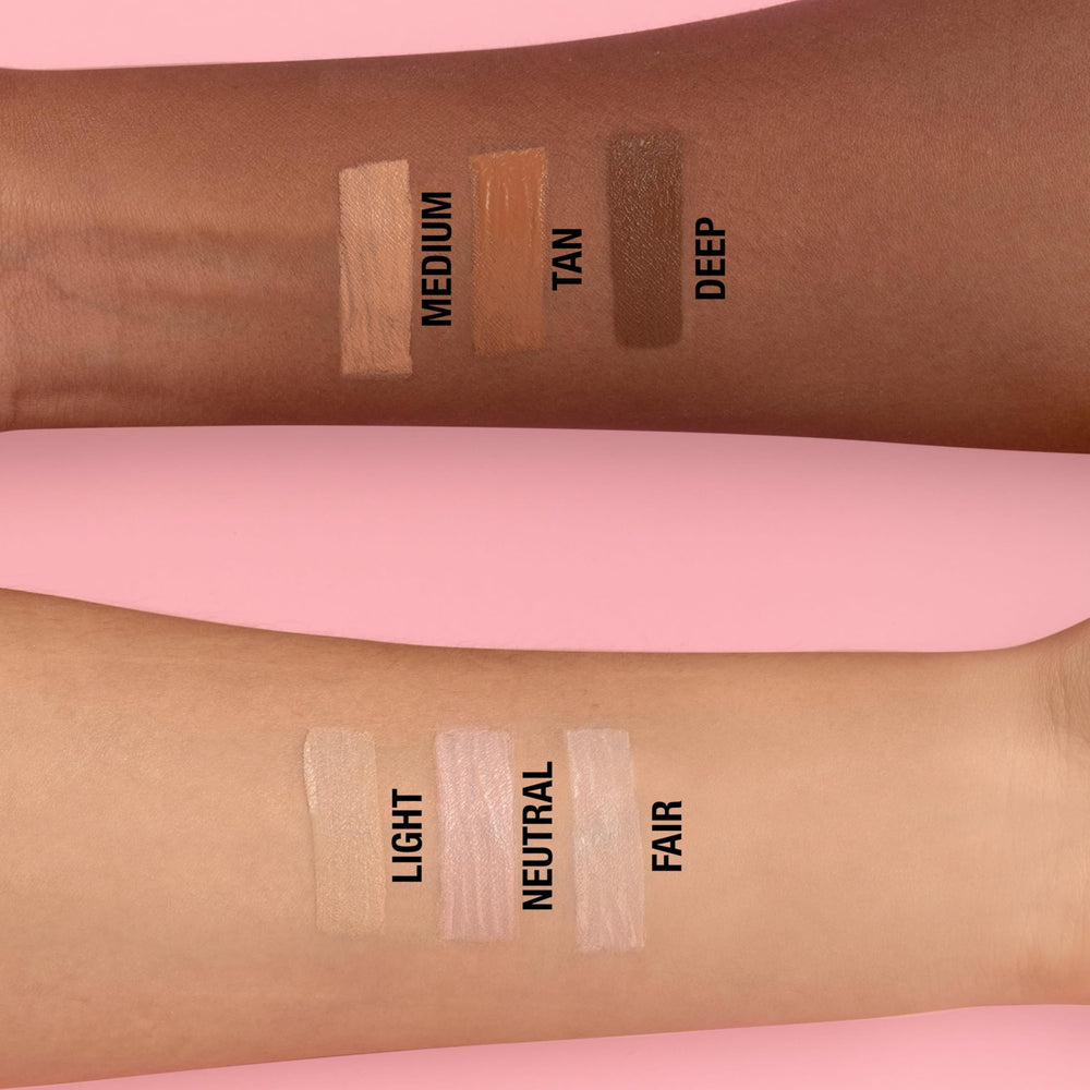 Highlighting cheekbone with Neutrogena Glow Perfector Pen for natural glow.