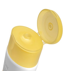 Neutrogena Sheer Zinc Kids applying sunscreen during outdoor play.