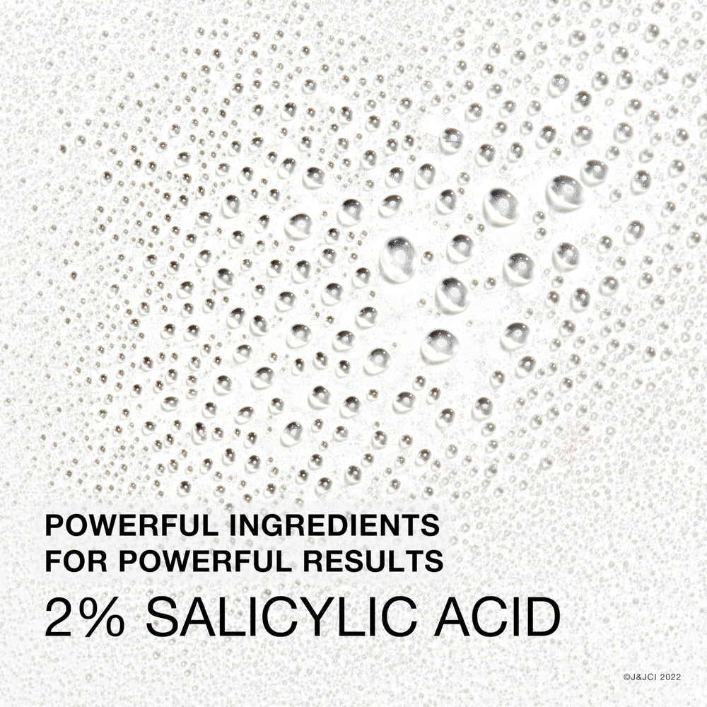 Neutrogena Stubborn Body Acne Spray on chest area for clearer skin.
