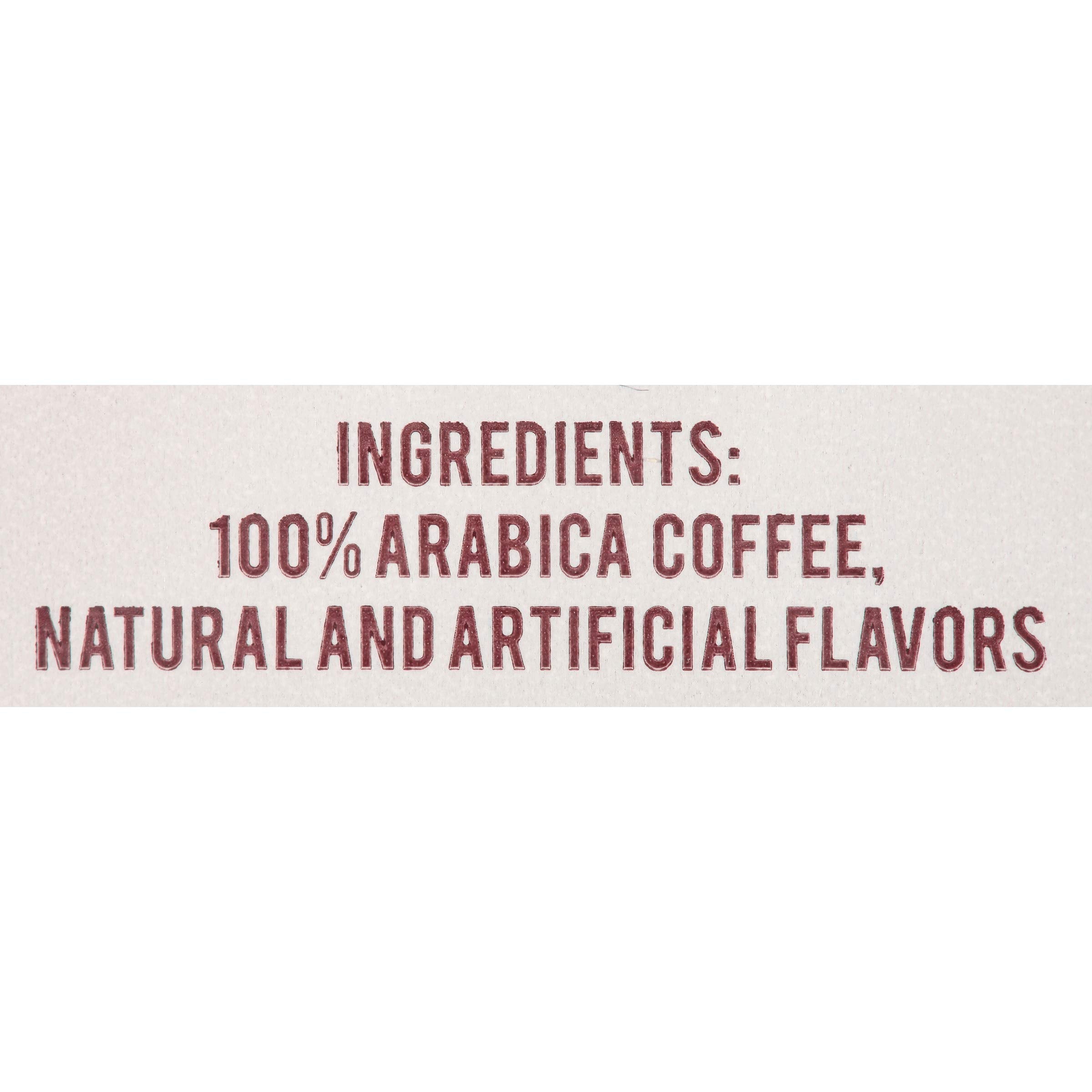 New England Coffee Caramel Macchiato cup shows creamy, smooth finish.