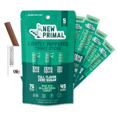 The New Primal Lightly Peppered Turkey Sticks pack front, convenient on-the-go snack.