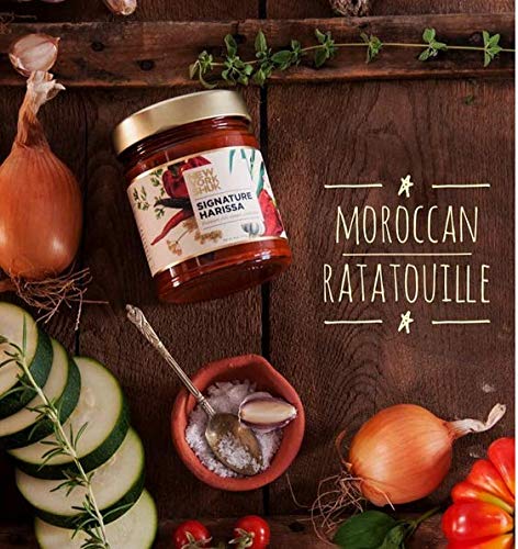 New York Shuk Signature Harissa dinner table shot invites family meals and aroma.