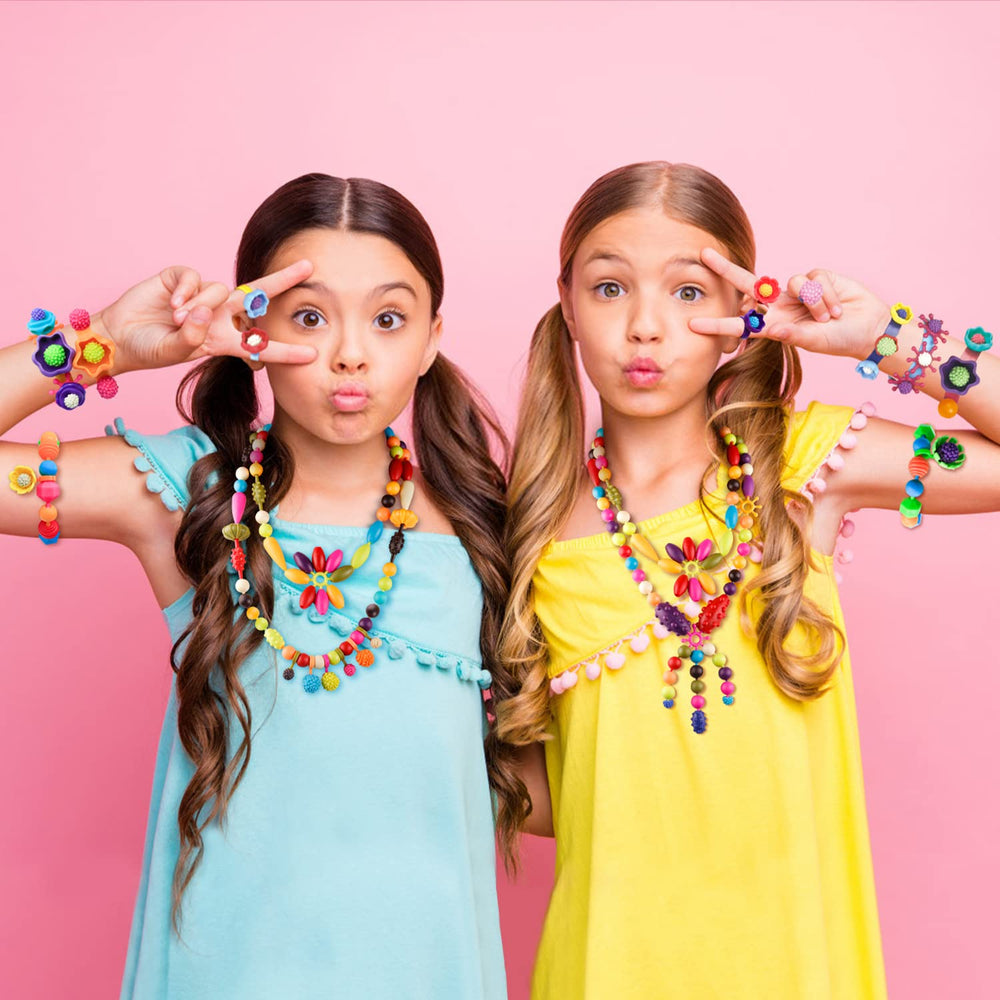 NEXBOX bracelet-making in progress demonstrates hands-on design and fine motor practice.