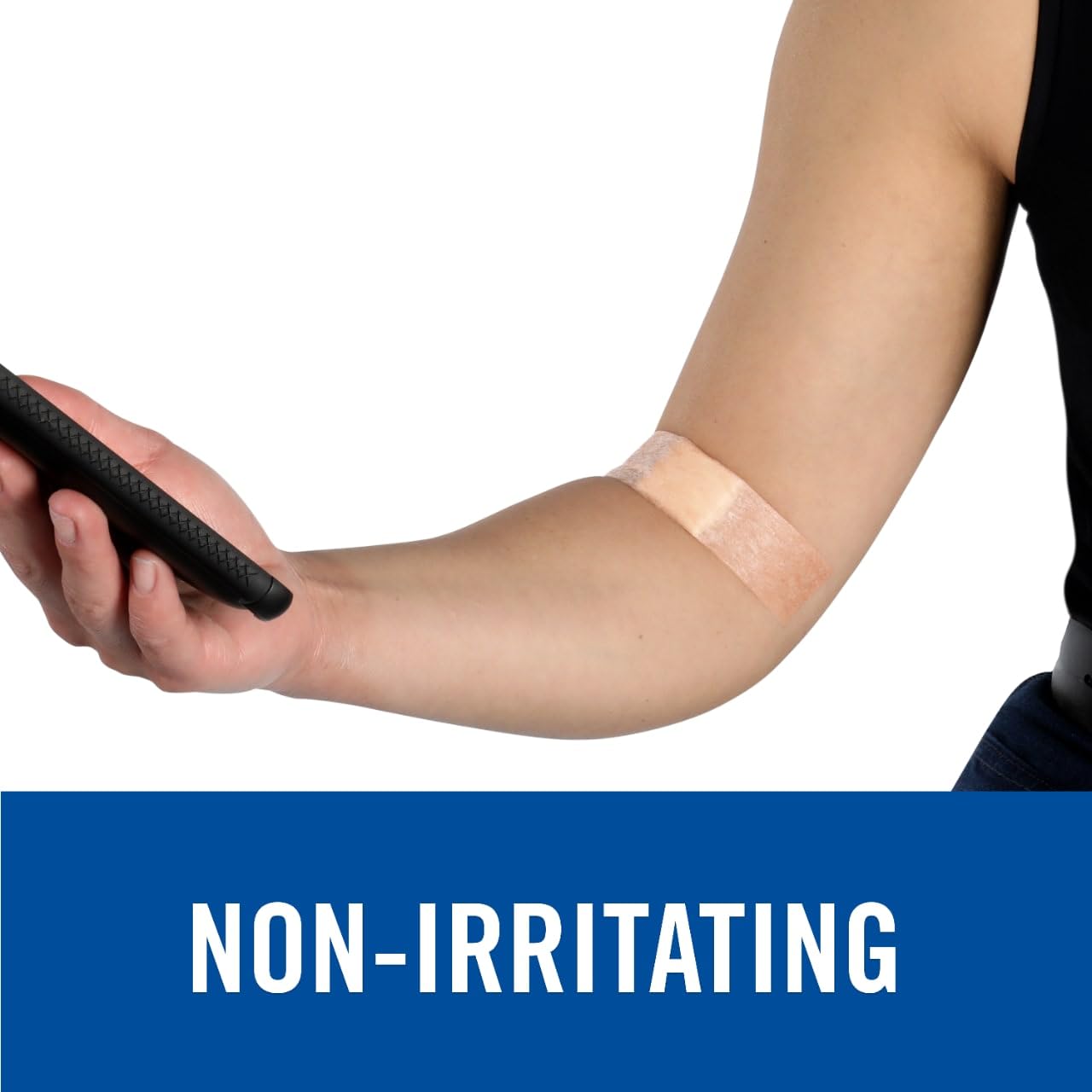 Nexcare tan tape applied to a finger for secure dressing.