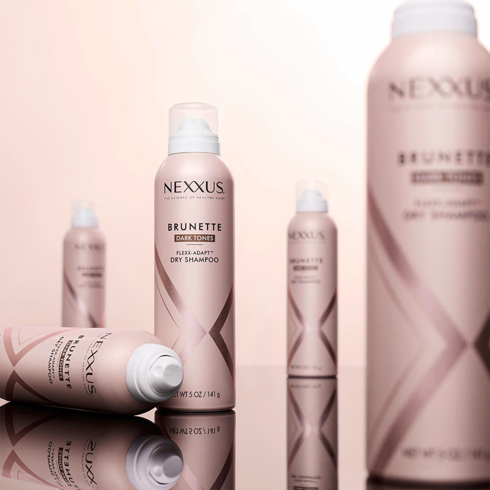 Nexxus Dry Shampoo bottle with shiny finish emphasizes vibrancy and shine