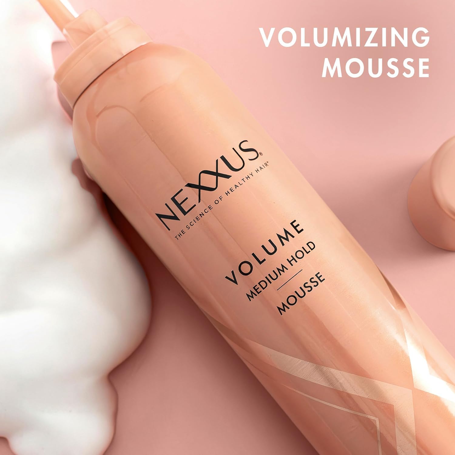 Nexxus Travel Mousse StyleProtect closeup illustrates flexible hold for touchable hair