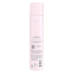 Close-up of Nexxus spray-dispense delivering an even mist for lasting hold.