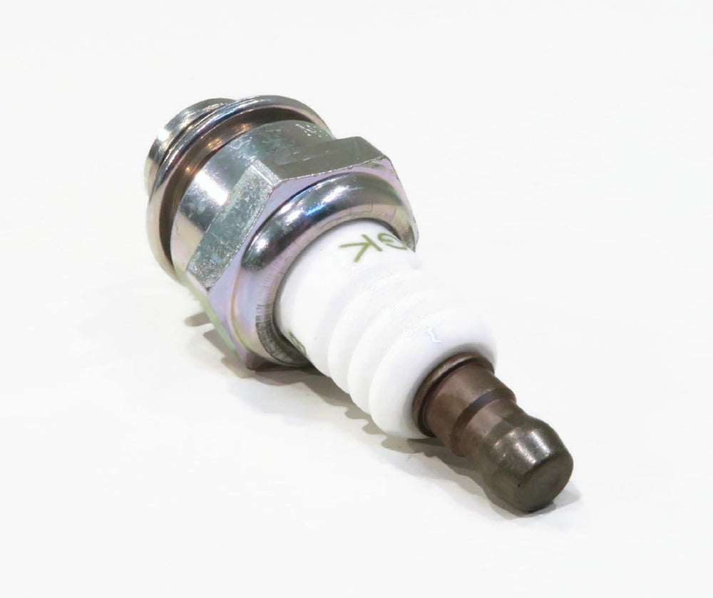 NGK strong ceramic insulator close-up indicating reliable insulation